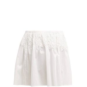 Merlette Eden Smocked cotton-lawn mini skirt